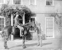 Young man on a horse at Sedgeford hall Ernest on horse back Original caption: Young man on a horse