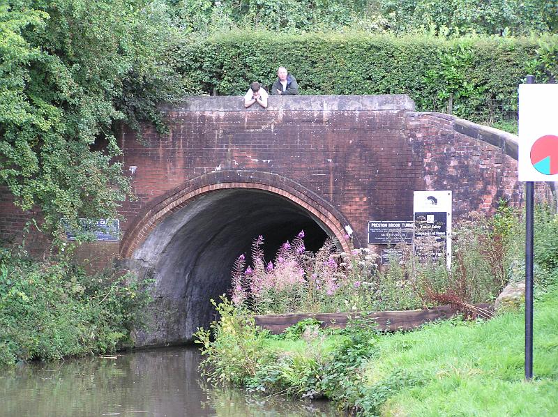 P8250131.JPG - Waiting to go through the Preston Brook tunnel.As the sign shows, you can only enter between half past the hour and twenty to the next hour.