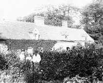 Mrs. C...'s cottages with 2 old people and herself Possibly rear of property at Dersingham. opposite Fern Hill junction (on Chapel Rd) in former ground of Dersingham Hall. Mrs C. being 'Clarkson' Original...