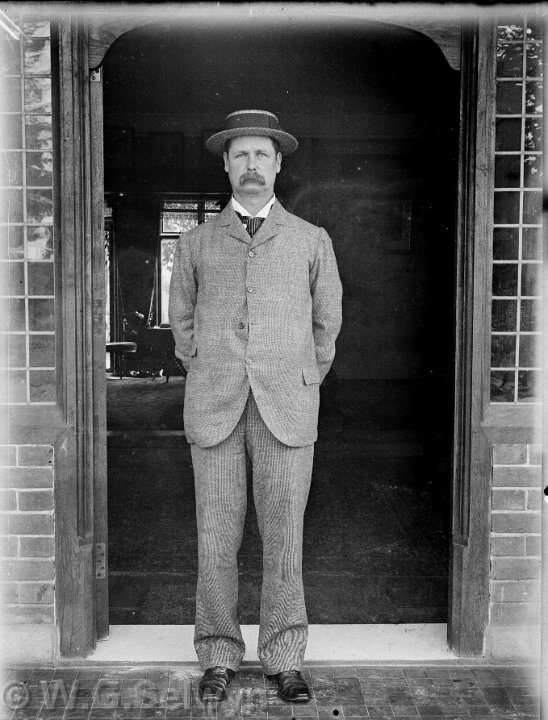 Mr. Hunt in doorway Original caption: Mr. Hunt in doorway