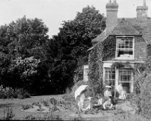 House with group not Sedgeford Original caption: House with group (not Sedgeford)