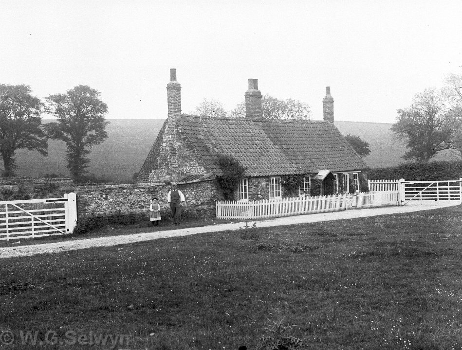 Workers cottage In the grounds of Sedgeford Hall Original caption: Workers cottage