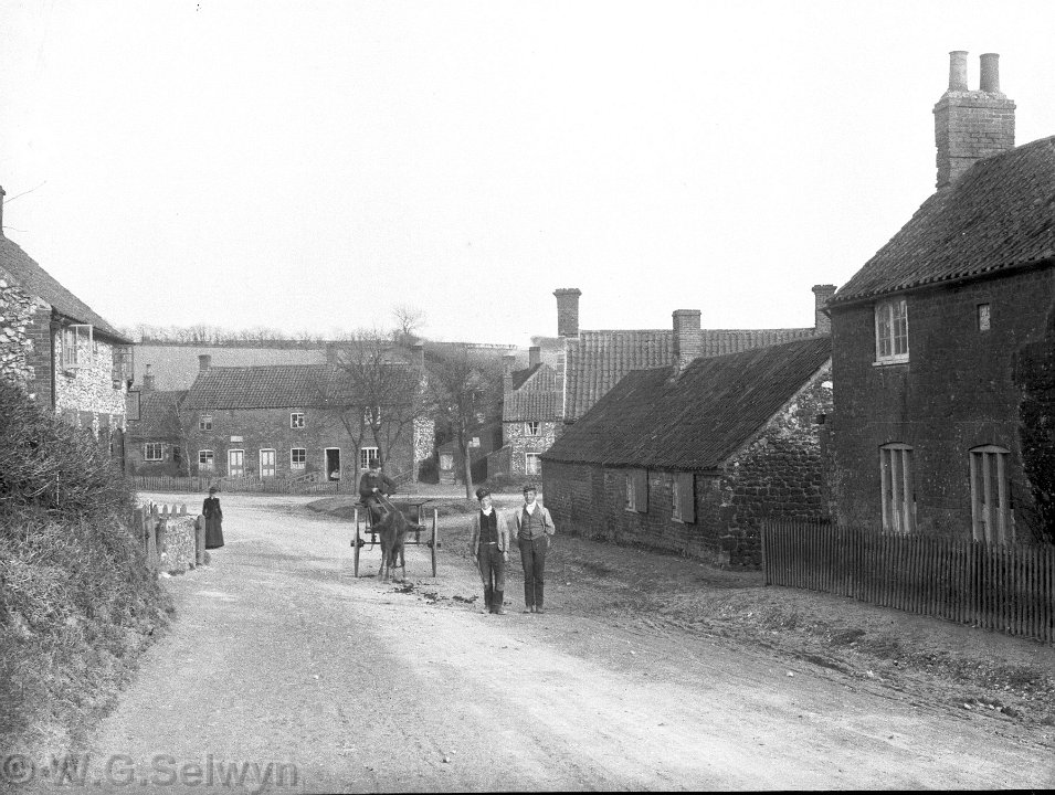 Village street scene Probably looking East towards Cole Green corner and the junction of Heacham Rd. and Fring Rd., Sedgeford Original caption: Village street scene