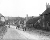 Village street scene Probably looking East towards Cole Green corner and the junction of Heacham Rd. and Fring Rd., Sedgeford Original caption: Village street scene