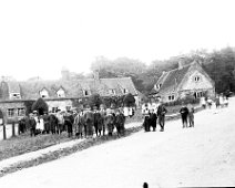 Crowd of villagers Heacham village green between Homemead and the church Original caption: Crowd of villagers