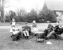 Family group on lawn, Sedgeford Hall Original caption: Family group on lawn