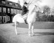 Girl on a moving horse Sedgeford Hall Original caption: Girl on a moving horse