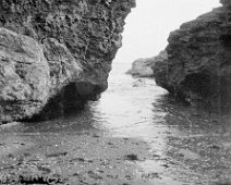 Rock at Splat Cove Original caption: Sea seen thr' cleft on rocks