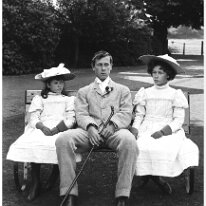 Donald, Gertie and Nona on garden seat Original caption: Donald, Gertie and Nona on garden seat