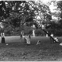 Group of children in cricket field Original caption: Group of children in cricket field
