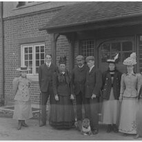 Group outside front door Hart Hill, Working Original caption: Group outside front door