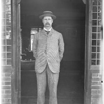 Mr. Hunt in doorway Original caption: Mr. Hunt in doorway