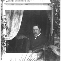 Father in a window Original caption: Father in a window
