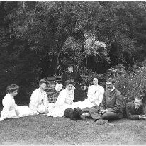 Group of young adults on lawn Original caption: Group of young adults on lawn