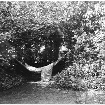 Lady asleep in a hammock Original caption: Lady asleep in a hammock