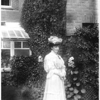 Lady in best dress and hat Original caption: Lady in best dress and hat