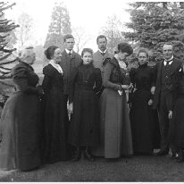 Family group on lawn at Hart Hill Original caption: Family group on lawn