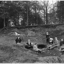 Group of own children in sandpit Sedgeford Hall Original caption: Group of own children in sandpit