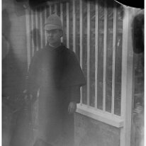 Boy with rifle bad neg Original caption: Boy with rifle (bad neg.)
