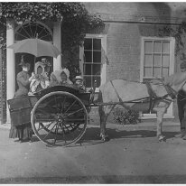 2 adults and 4 very young children in ponycart Sedgeford Hall Original caption: 2 adults and 4 very young children in ponycart