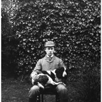 Donald with Rock on lap Original caption: Donald with Rock on lap