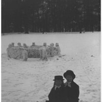 Gertie & Nona on one small toboggan Original caption: Gertie and Nona on one small toboggan