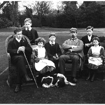 Family group on lawn Sedgeford Hall Original caption: Family group on lawn
