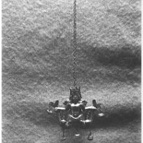 Mrs. Rolfe's charms Original caption: Mrs. Rolfe's charms