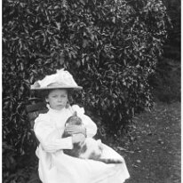 Helen with cat on lap Original caption: Helen with cat on lap