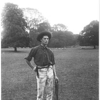 Gilbert in N.Z. uniform Sedgeford Hall park Original caption: Gilbert in N.Z. uniform
