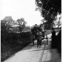 Mr. Tayler with basket cart Fring Lane Original caption: Mr. Tayler with basket cart