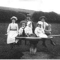 Group on merrygoround Original caption: Group on merrygoround
