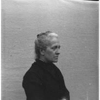 Mother sitting down Original caption: Mother sitting down