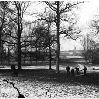 Tobogganing in park View through park to Wisbech House and Sedgeford mill on Ringstead road. Wisbech House was demolished in 2019 Original caption: Tobogganing in park