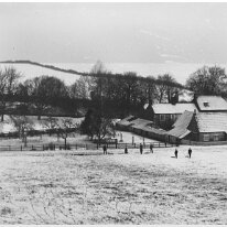 Snowy landscape Sedgeford Hall from hillside to the south-west Original caption: Snowy landscape