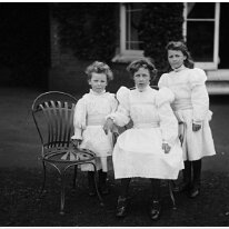 3 girls in 1891 Sedgeford Hall Original caption: 3 girls in 1891