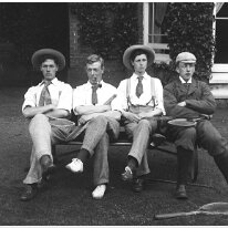 Tennis group in front of the drawing room window, Sedgeford Hall Original caption: Tennis group