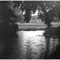 Mr. H. on lake in canoe Sedgeford Park Original caption: Mr. H. on lake in canoe