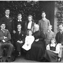 Family on lawn Sedgeford Hall Original caption: Family on lawn