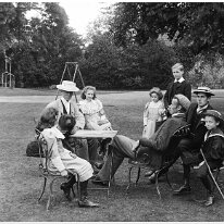 Family group on lawn Sedgeford Hall Original caption: Family group on lawn
