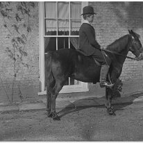 William with boy on pony Original caption: William with boy on pony