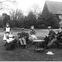 Family group on lawn, Sedgeford Hall Original caption: Family group on lawn