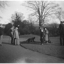 Family on lawn after church Original caption: Family on lawn after church
