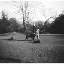 Father with 3 dogs Original caption: Father with 3 dogs