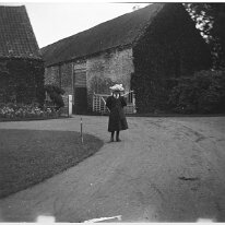 Probably Helen on driveway Sedgeford Hall Original caption: Probably Helen on driveway
