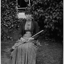 A lady with a croquet mallet Original caption: A lady with a broom