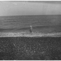 Man paddling at seaside Original caption: Man paddling at seaside