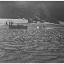 South end of Sunny Cove Salcombe Harbour Original caption: View of beach party from a boat