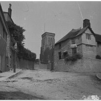 Holy Trinity church, Salcombe, Devon Looking up Market St., Salcombe Original caption: A village scene