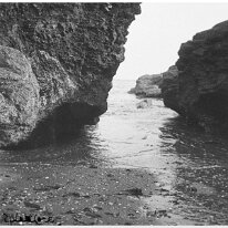 Rock at Splat Cove Original caption: Sea seen thr' cleft on rocks
